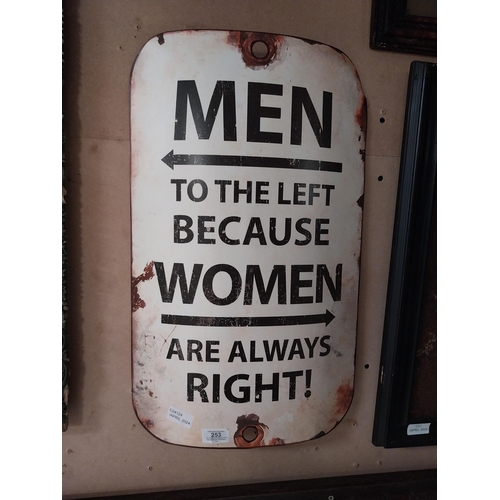 253 - Tinplate Men to the Left because Women are always Right tinplate sign. {55 cm H x 34 cm W}.