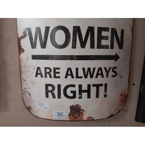 253 - Tinplate Men to the Left because Women are always Right tinplate sign. {55 cm H x 34 cm W}.