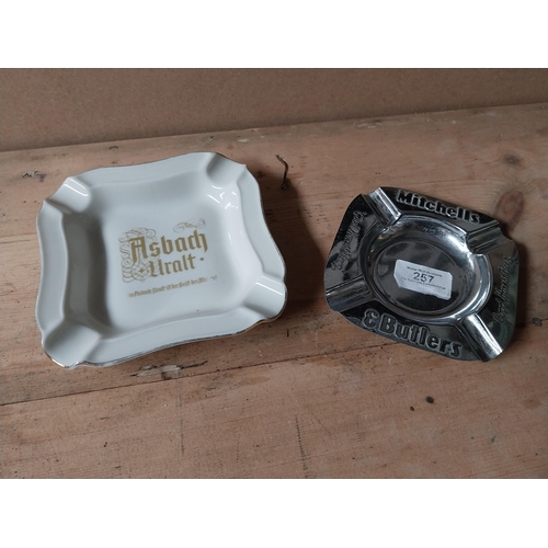 257 - Chrome Mitchell and Butlers ashtray {12 cm H x 12 cm W} and Asbach Uralt ashtray {14 cm h x 14 cm D}... 