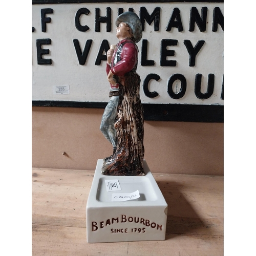 263 - Jim Beam ceramic advertising figure. {33 cm H x 17 cm W x 10 cm D}.