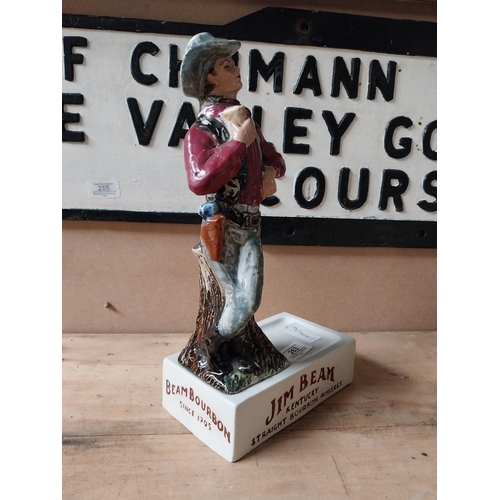 263 - Jim Beam ceramic advertising figure. {33 cm H x 17 cm W x 10 cm D}.