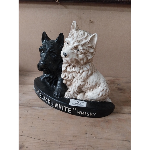 283 - Composition Black and White Whiskey advertising Scottie Dogs. {19 cm H x 26 cm W x 8 cm D].