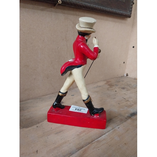 284 - Johnnie Walker composition advertising figure. {20 cm H x 12 cm W x 7 cm D}.