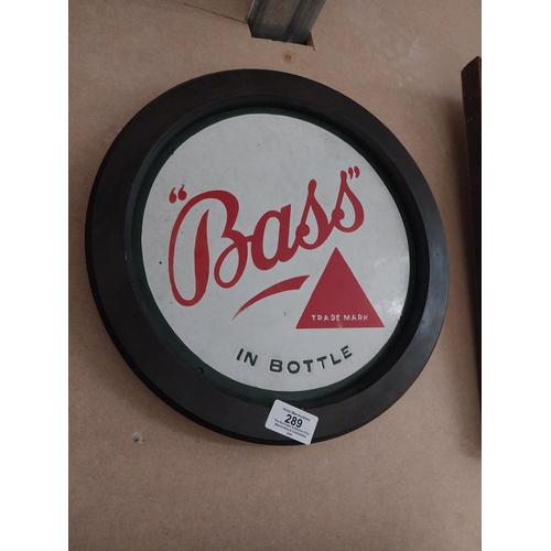 289 - Bass in Bottle framed enamel advertising sign {31 cm H x 31 cm W}.