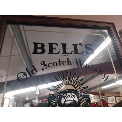 291 - Bell's Old Scotch Whisky framed advertising mirror. {45 cm H x 39 cm W}.