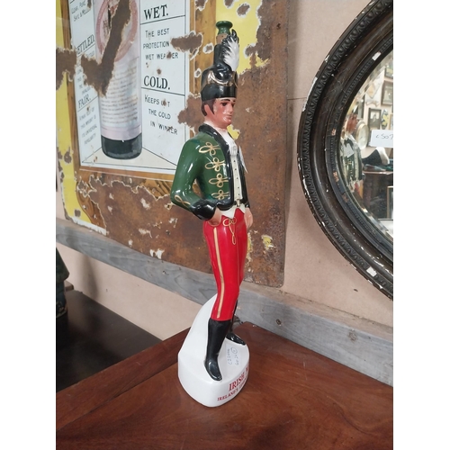 301 - Irish Mist Dragoon ceramic advertising figure. {43 cm H x 13 cm W x 8 cm D}.