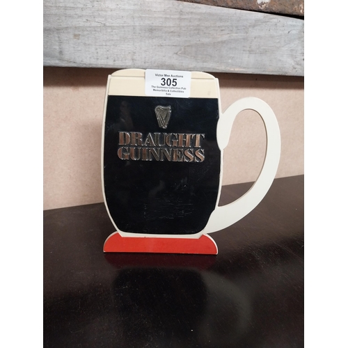 305 - 1970's Draught Guinness Perspex counter stand. {17 cm H x 16 cm W}.