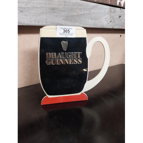 305 - 1970's Draught Guinness Perspex counter stand. {17 cm H x 16 cm W}.