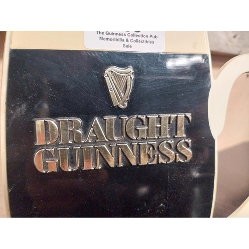 305 - 1970's Draught Guinness Perspex counter stand. {17 cm H x 16 cm W}.