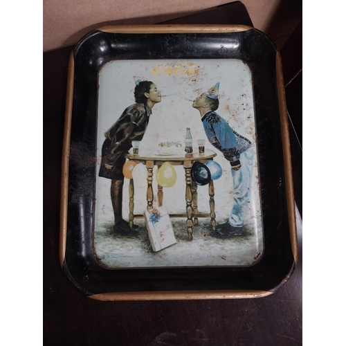 309 - Three tinplate Coca Cola advertising drinks trays. {24 cm H x 27 cm W}.