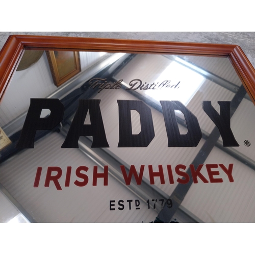 319 - Framed Paddy Irish Whiskey advertising mirror. {69 cm H x 55 cm W}.