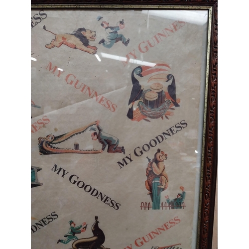 32 - Framed Guinness wrapping paper. {55 cm H x 45 cm W}.