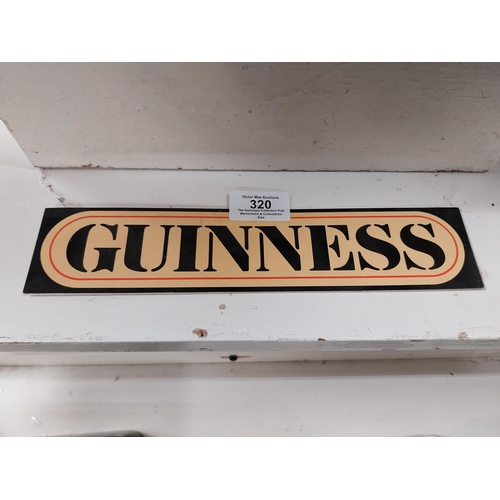 320 - Guinness Perspex stick on shelf sign. {6 cm H x 26 cm W}.