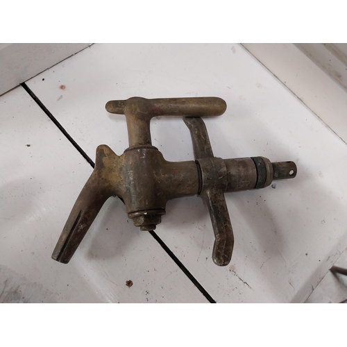 324 - Five Early 20th C. brass barrel taps. {10 cm H x 21 cm W}.