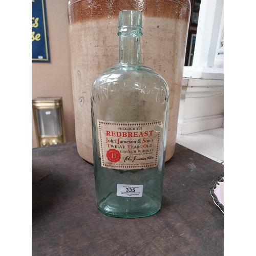 335 - Early 1900's Redbreast Whiskey Imperial Bottle with original label. {29 cm H x 10 cm W x 7 cm D}.