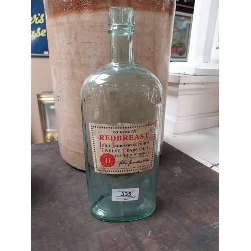 335 - Early 1900's Redbreast Whiskey Imperial Bottle with original label. {29 cm H x 10 cm W x 7 cm D}.