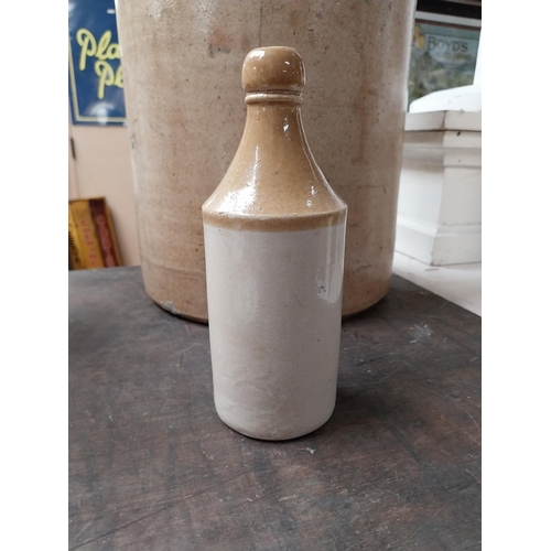 336 - Rare 19th C. stoneware ginger beer bottle Guinness XX Thomas Adams Lisnaskea. {19 cm H x 7 cm Dia.}.