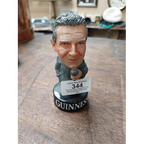 344 - John Motson football pundit collectible talking figure. {11 cm H x 5 cm W x 5 cm D}.