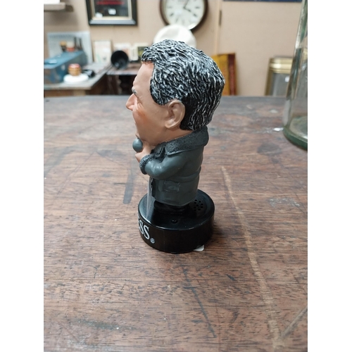 344 - John Motson football pundit collectible talking figure. {11 cm H x 5 cm W x 5 cm D}.