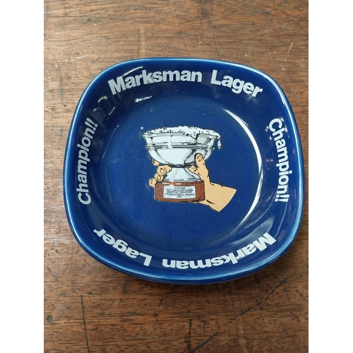 345 - Grant's Scotch Whiskey Wade ceramic ashtray {5 cm H x 15 cm W x 15 cm D} and Marksman Lager ceramic ... 