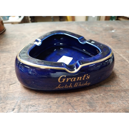 345 - Grant's Scotch Whiskey Wade ceramic ashtray {5 cm H x 15 cm W x 15 cm D} and Marksman Lager ceramic ... 