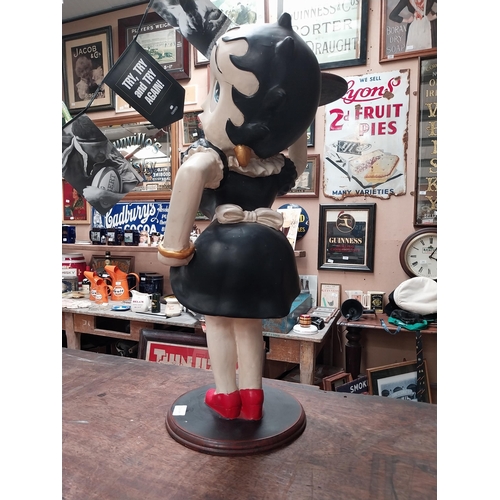 351 - Betty Boop advertising figure on stand with Underberg bottles. {73 cm H x 50 cm W}.