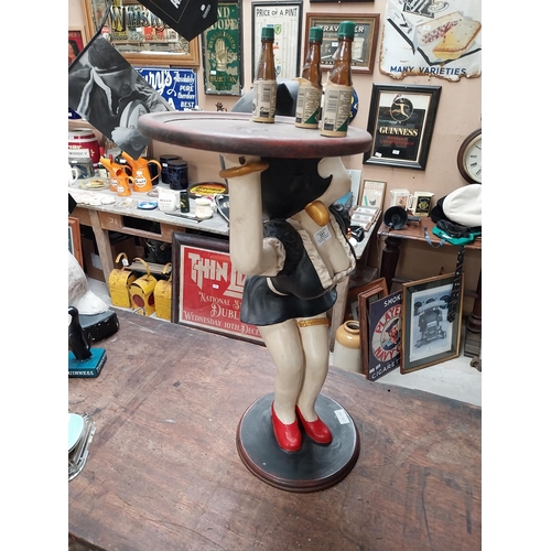 351 - Betty Boop advertising figure on stand with Underberg bottles. {73 cm H x 50 cm W}.