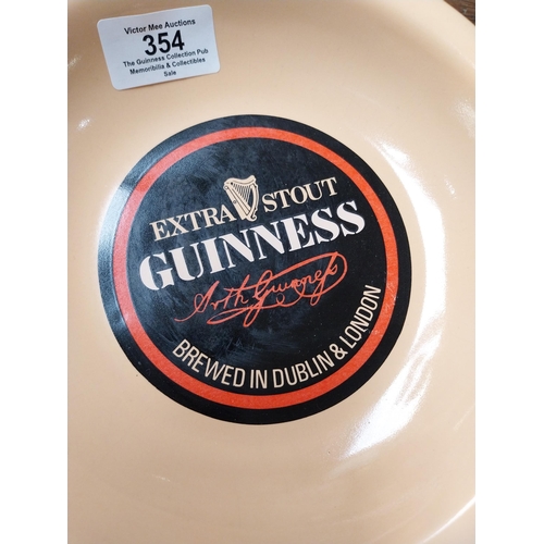 354 - Guinness ceramic ashtray in form of bottle cap {5 cm H x 23 cm Dia.}