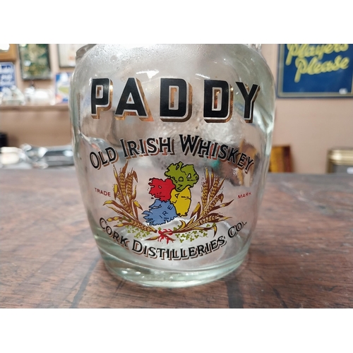 355 - Paddy Old Irish Whiskey glass decanter. {21 cm H x 11 cm Dia.}.