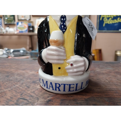 358 - Martell Cognac Staffordshire advertising figure. {16 cm H x 8 cm W x 8 cm D}.