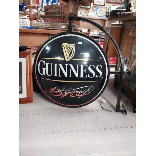 365 - Double sided Guinness light up advertising sign with bracket {62 cm H x 97 cm W}.