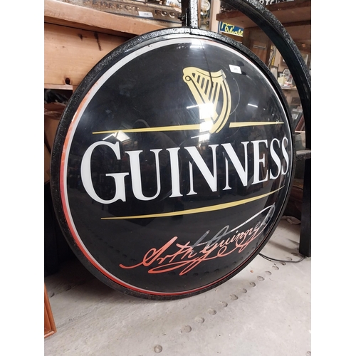 365 - Double sided Guinness light up advertising sign with bracket {62 cm H x 97 cm W}.