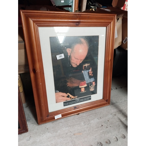 366 - Framed Guinness print of Ginger undefeated Heavyweight  World Champion. {58 cm H x 48 cm W}.