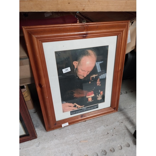 366 - Framed Guinness print of Ginger undefeated Heavyweight  World Champion. {58 cm H x 48 cm W}.