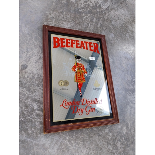 367 - Framed Beefeater London Dry Gin advertising mirror. {64 cm H x 36 cm W}.