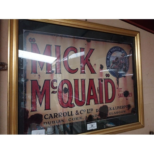 38 - Framed Mick McQuaid advertising print. {42 cm H x 52 cm W}.