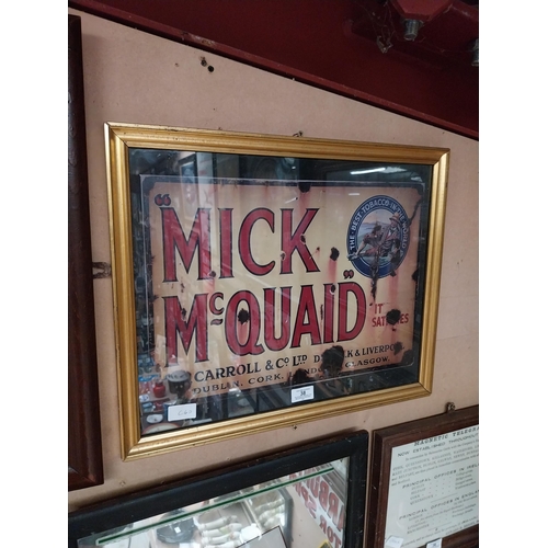 38 - Framed Mick McQuaid advertising print. {42 cm H x 52 cm W}.