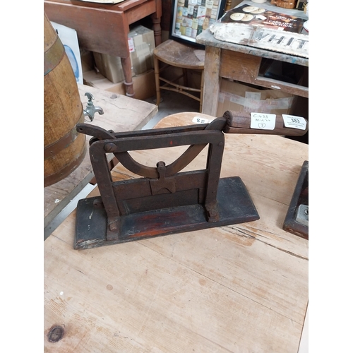 383 - Early 20th C. metal and wood tobacco cutter. {32 cm H x 72 cm W x 10 cm D}.