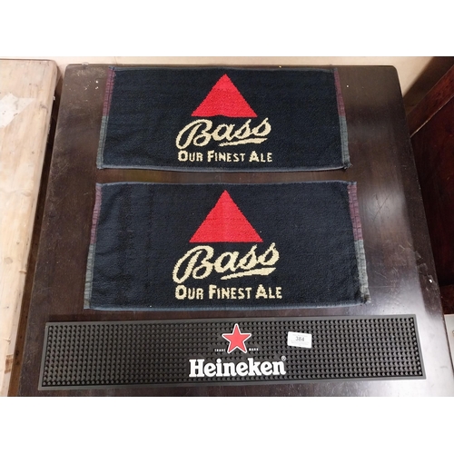 384 - Heineken Beer mat and two Bass beer mats. {10 cm H x 60 cm W}.