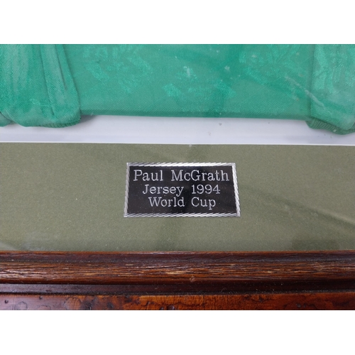 386 - Framed Paul McGrath 1994 World Cup Irish Jersey signed on glass {75 cm H x 83 cm W}.