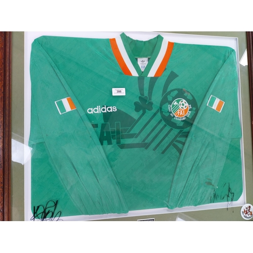 386 - Framed Paul McGrath 1994 World Cup Irish Jersey signed on glass {75 cm H x 83 cm W}.