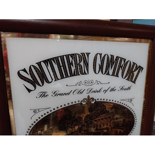 39 - Framed Southern Comfort glass advertisement. {54 cm H x 47 cm W}.