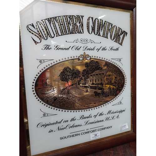 39 - Framed Southern Comfort glass advertisement. {54 cm H x 47 cm W}.