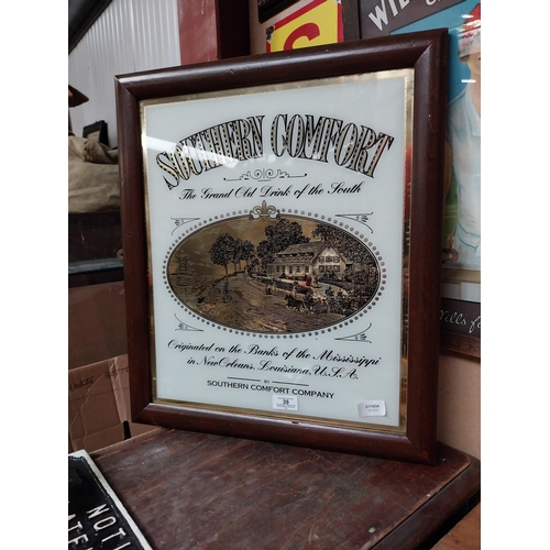 39 - Framed Southern Comfort glass advertisement. {54 cm H x 47 cm W}.