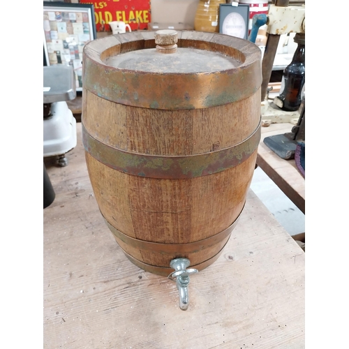 391 - Rubio's Golden Cream advertising barrel with metal mounts. {35 cm H x 35 cm Dia.}.