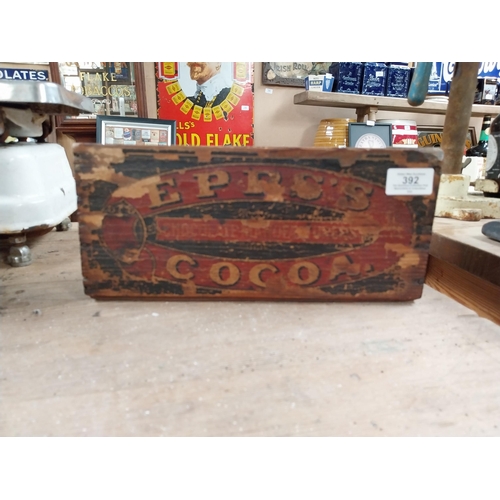 392 - EPPS's Cocoa wooden advertising box. {14 cm H x 31 cm W x 13 cm D}.