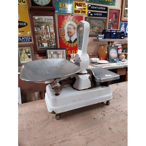 393 - 1940's enamel and chrome shop scales. {64 cm H x 56 cm W x 43 cm D}