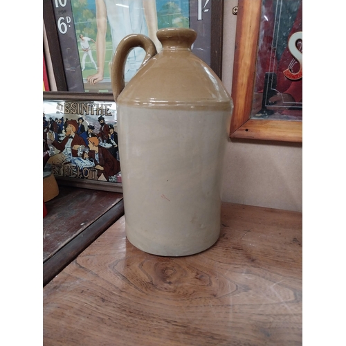 4 - Two 19th C. stoneware flagons. {41 cm H x 22 cm Dia.} and {32 cm H x 17 cm Dia.}