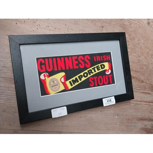 418 - Guinness framed showcard. {20 cm H x 32 cm W}.