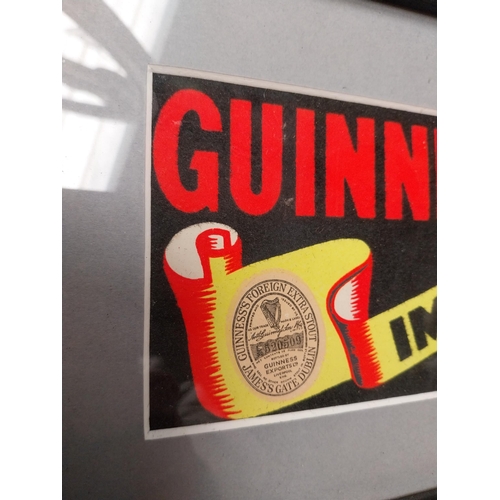 418 - Guinness framed showcard. {20 cm H x 32 cm W}.